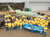 The manufacturing crew of Cessna stopped to pose with the rollout jet