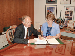 Peaslee with Vermont Gov. Jim Douglas. Peaslee is a fierce defender of the transportation budget and funding for small airports.