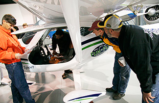 Onlookers take the opportunity to get close up to the Remos.