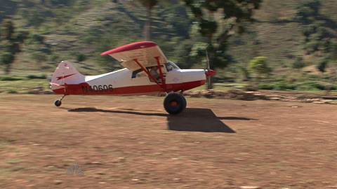A Maule lands at the 1,500-foot airstrip that volunteers hacked out of the rocky terrain to provide access to a remote Haitian village.