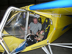 Lance Anderson takes his new grandson, Nicholas, for a ride.