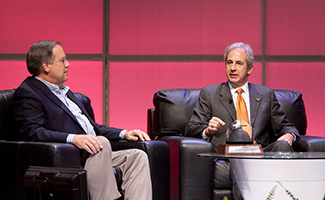 AOPA President Craig Fuller congratulates Victor Bird on winning the 2010 Hartranft Award.