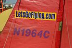 A message on the tail promotes AOPA&rsquo;s Let&rsquo;s Go Flying Web site.