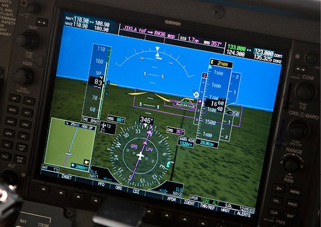 An avionics display shows an LPV procedure being flown. 