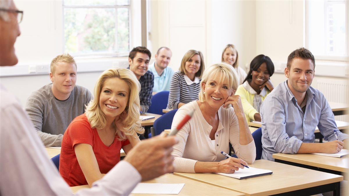 Senior tutor teaching class