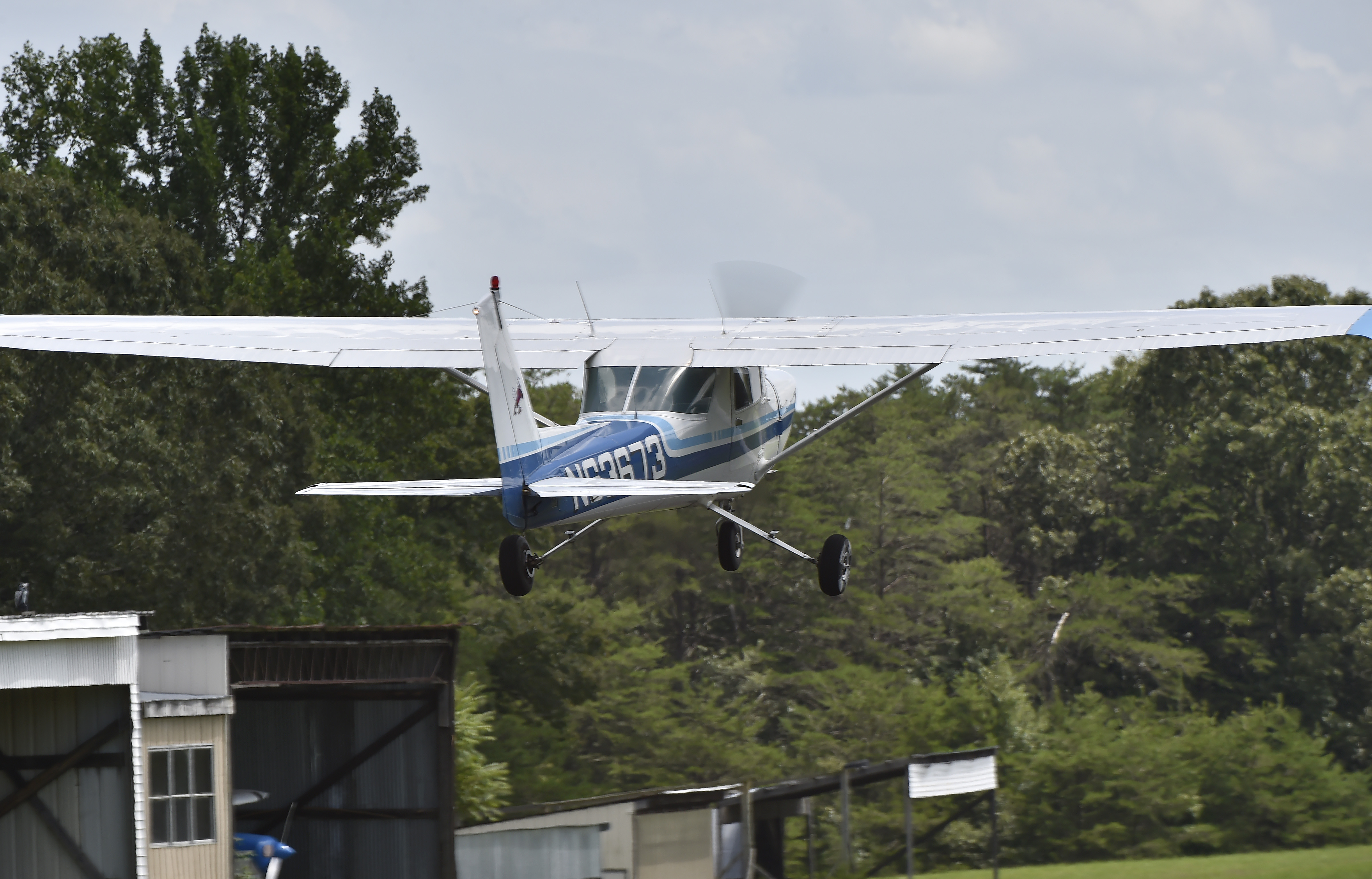High school student Joel Cihak lifts off from  New London Airport's Runway 18 for his first solo flight.