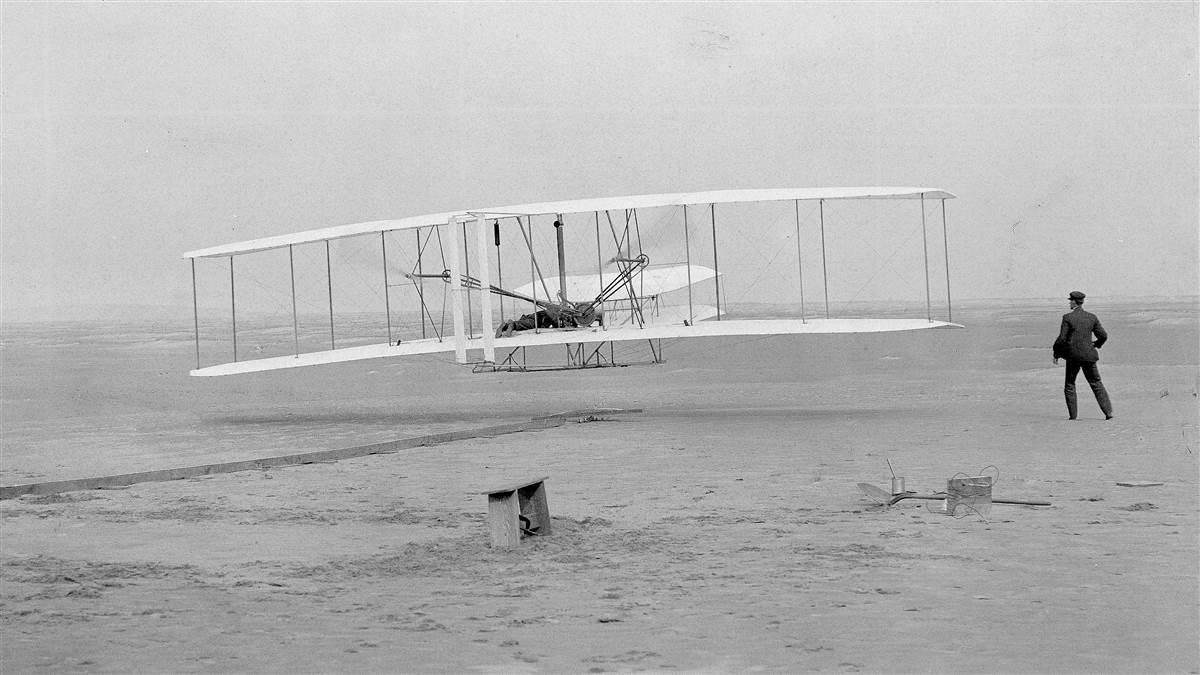 The iconic image of the first powered flight near Kitty Hawk, North Carolina, Dec. 17, 1903. Photo by John T. Daniels.
