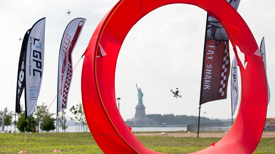 Quadcopters navigate through gates at speeds exceeding 60 mph at the U.S. National Drone Racing Championships. Jim Moore photo.