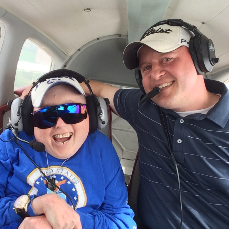 Nathan Kublank (right) with Matt in a Piper Cherokee.