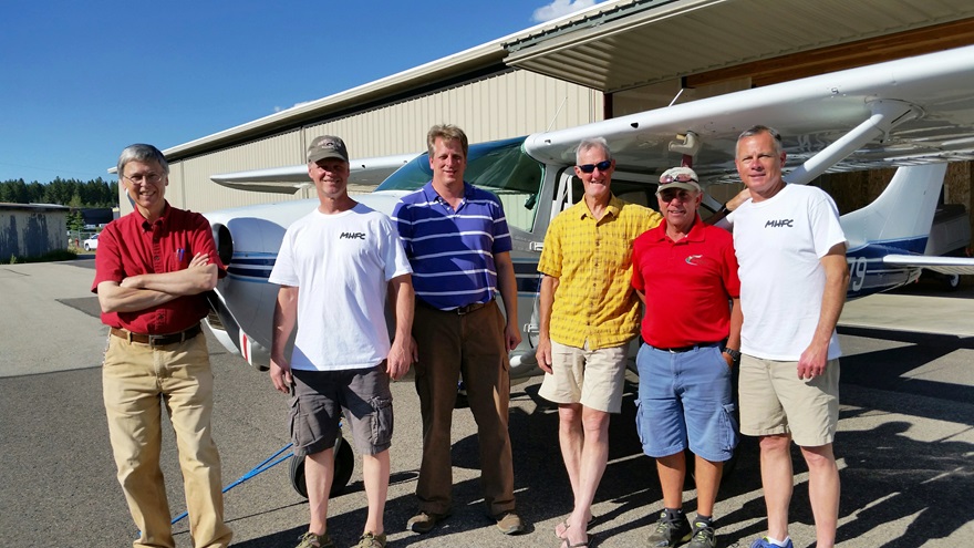 Pictured (L to R): David Simmonds, Randy Resimuis, McCall Airport Manager Jay Scherer, Mark Thorien, Mike Peterson, and MYL High Flying Club President Joe Carter. Missing from the photo are Ashley Taylor, Levi Johnson, and flight instructor Mike Weiss.