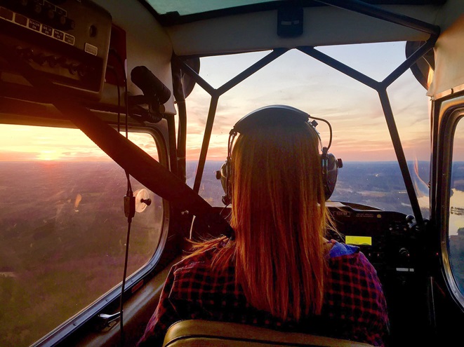 Sierra Lund pilots her dad's Citabria on a sunset flight near their Peachtree City, Georgia, home. Photo courtesy of Kevin Lund.