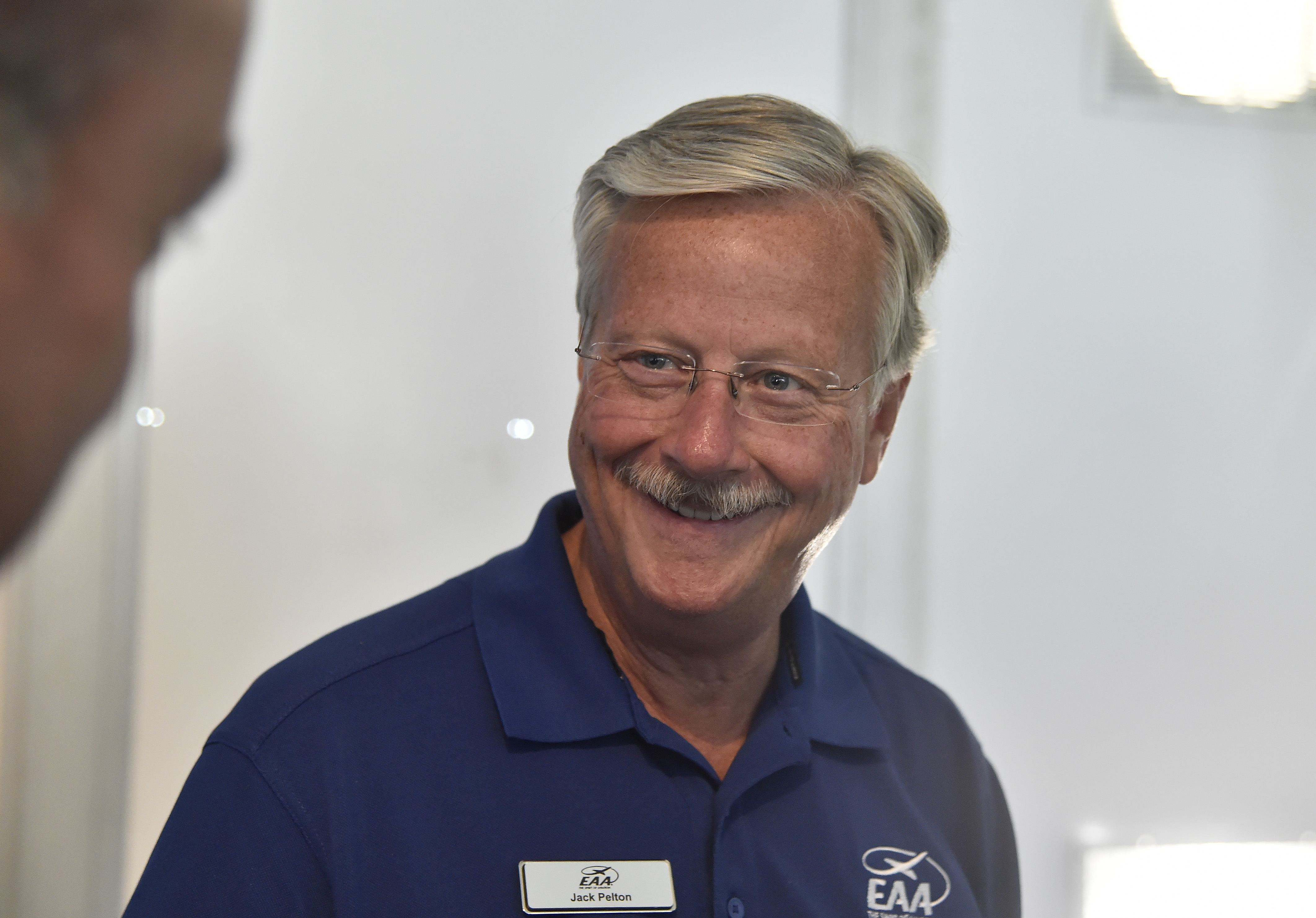 EAA CEO and Chairman Jack Pelton pronounces AirVenture 2016 a success during closing remarks at Wittman Regional Airport in Oshkosh July 31. Photo by David Tulis.
