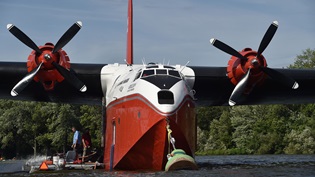 Coulson Aviation's Martin Mars water tanker is moored at Lake Winnebago. Photo by David Tulis.