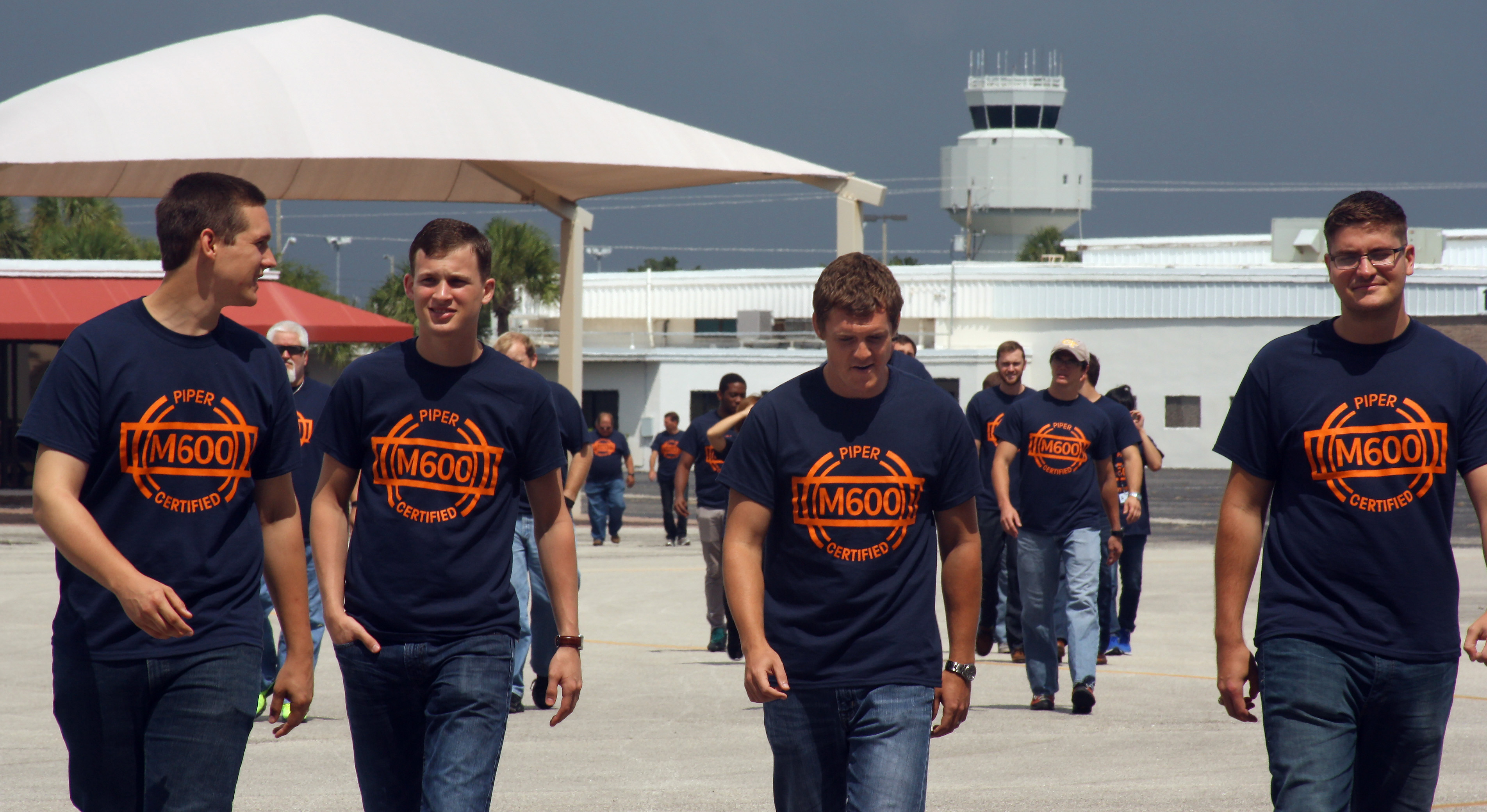 Piper Aircraft employees wear shirts to commemorate the M600's type certification during a celebration at the company's Vero Beach, Florida, facility. Photo by Jamie Beckett.