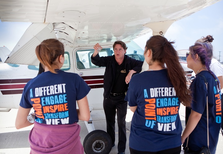 Above All Aviation chief pilot William Peterson talks about aviation with A Different Point of View high school students during career day at the Santa Barbara Municipal Airport June 25. Photo courtesy of Lynn Houston.