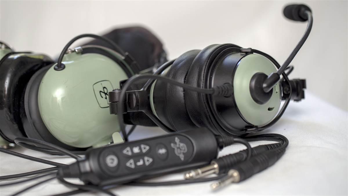 David Clark's new ONE-X headset, at right, is more compact than the previous generation models. Jim Moore photo. 