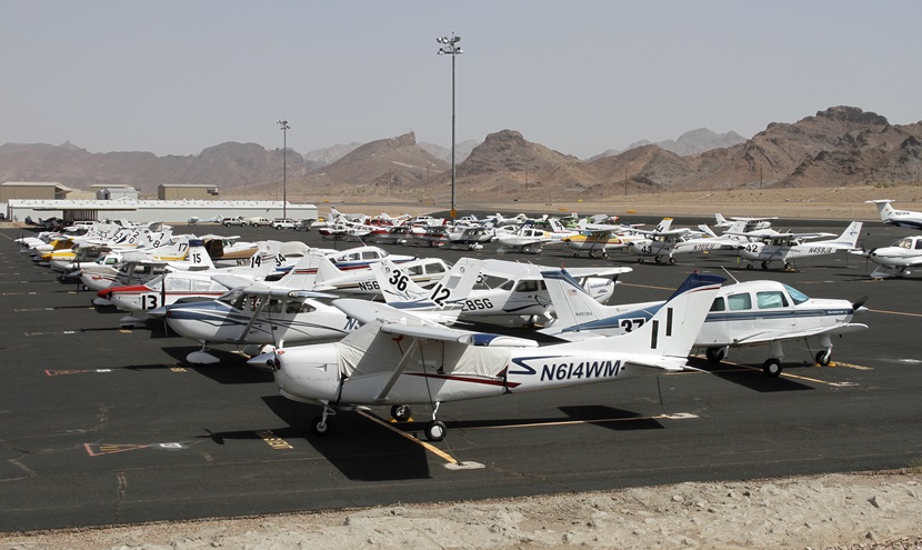 Air Race Classic aircraft line the ramp before the start of the 2012 event in Lake Havasu, Arizona. Photo courtesy of the Air Race Classic.