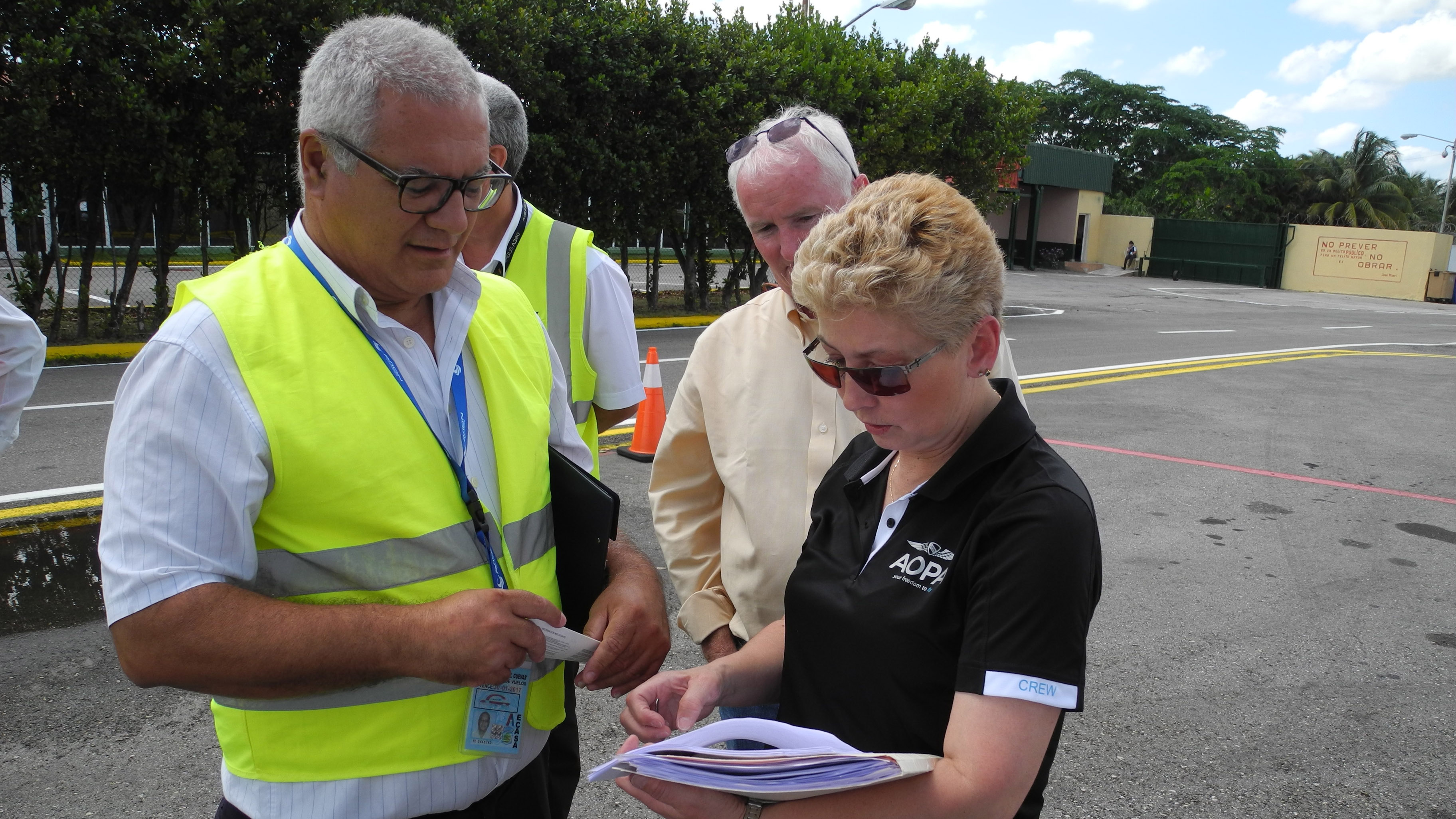 Processing into and out of Cuba is a multi-step effort, as AOPA corporate pilot Luz Beattie, a native Spanish speaker, and AOPA President Mark Baker learn in Havana.