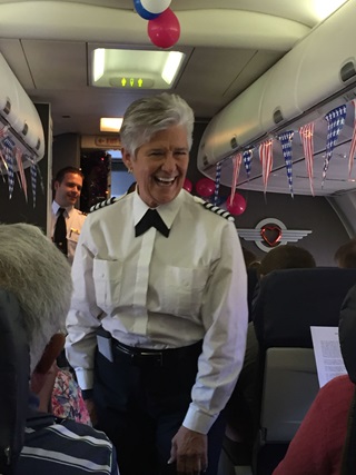 Debby Rihn-Harvey enjoys talking to passengers before her flight from Houston's William P. Hobby Airport to Valley International Airport in Harlingen, Texas. Photo by Cindy Hasselbring.
