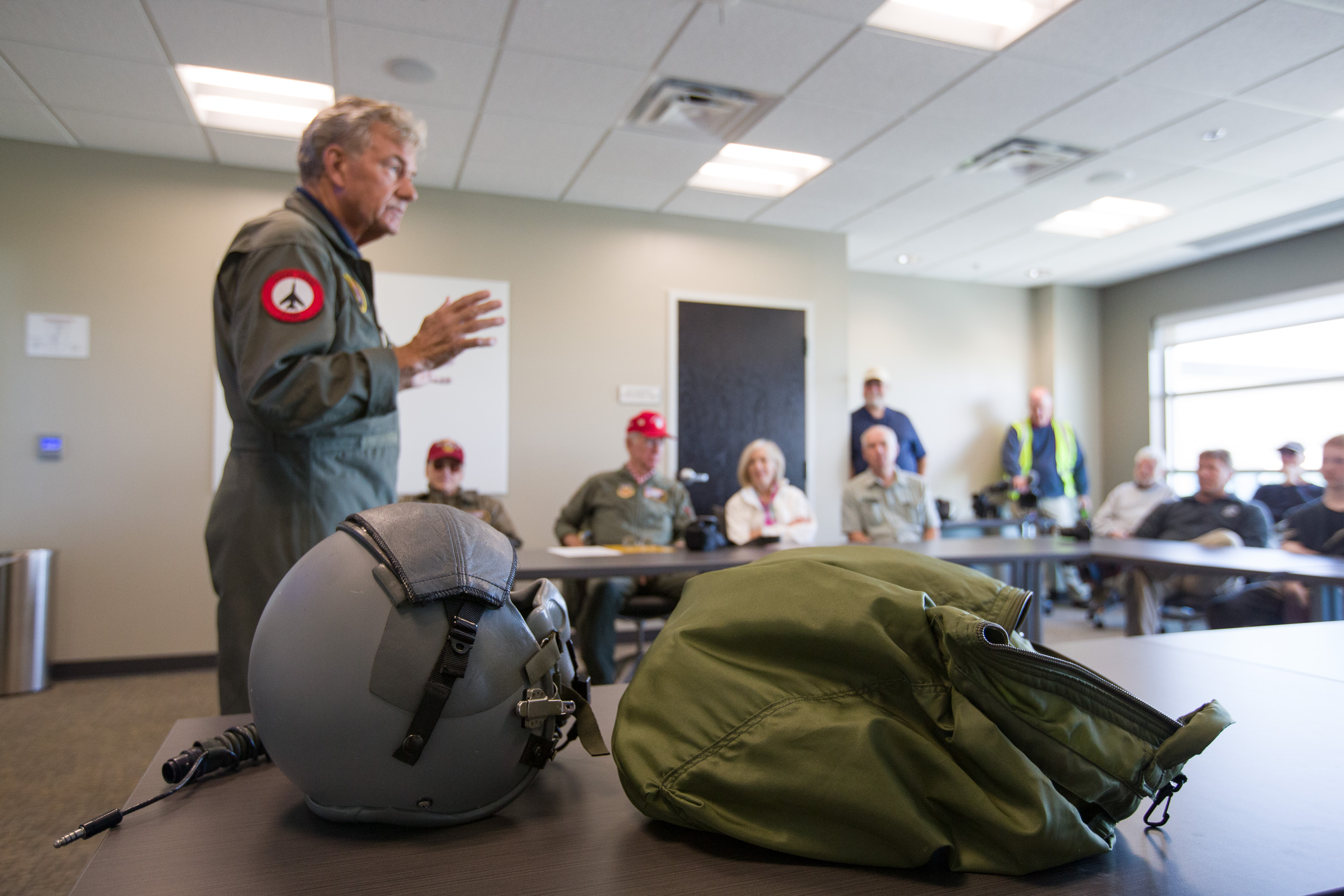 F-100F owner Dean Cutshall briefs pilots on the flights for the day. Photo by Mike Fizer.