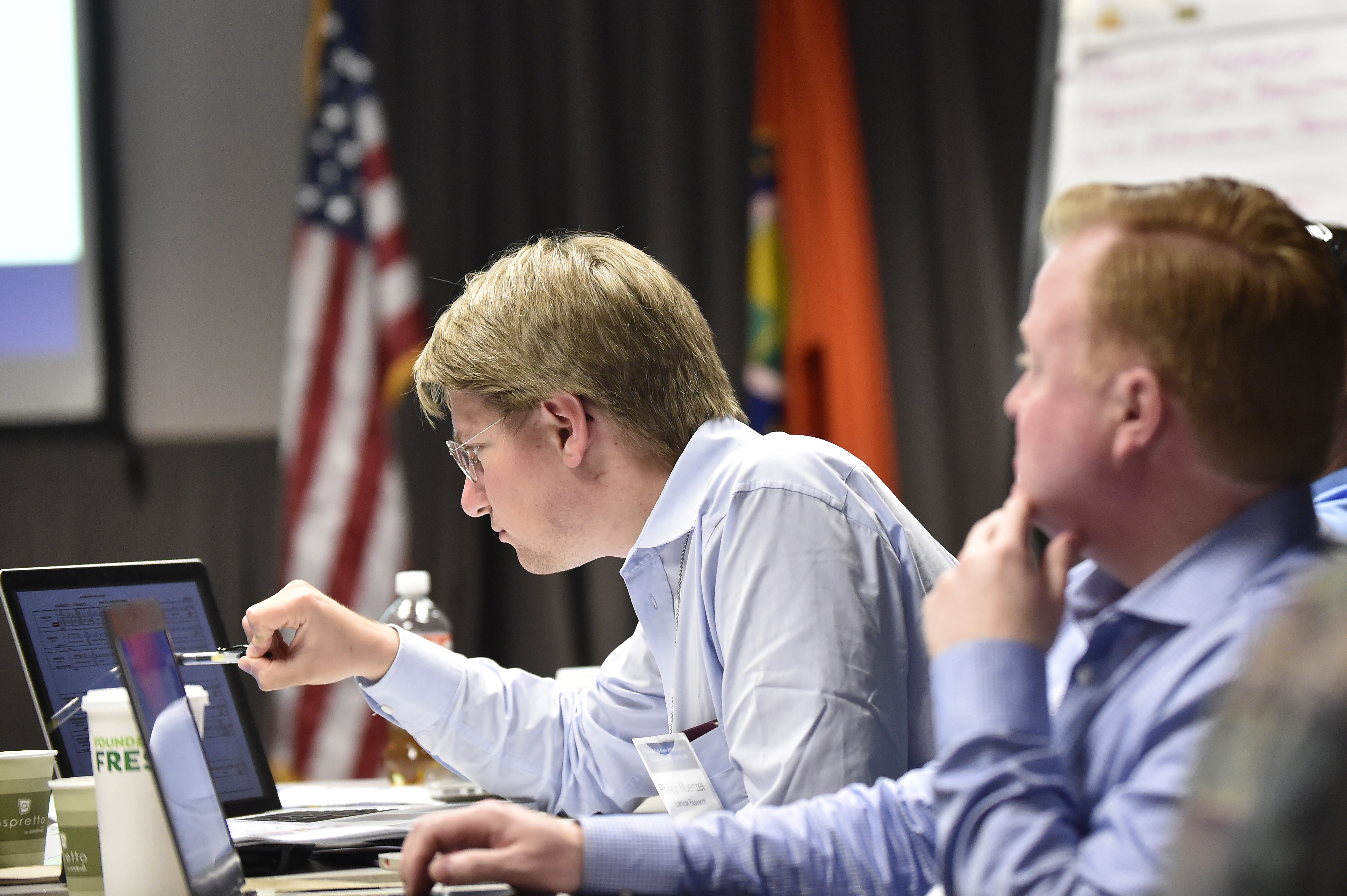 Phillip Muenzel of Laminar Research's X-Plane participates in a meeting on how the FAA's aeronautical data could be used in future aviation software applications. Photo by David Tulis.