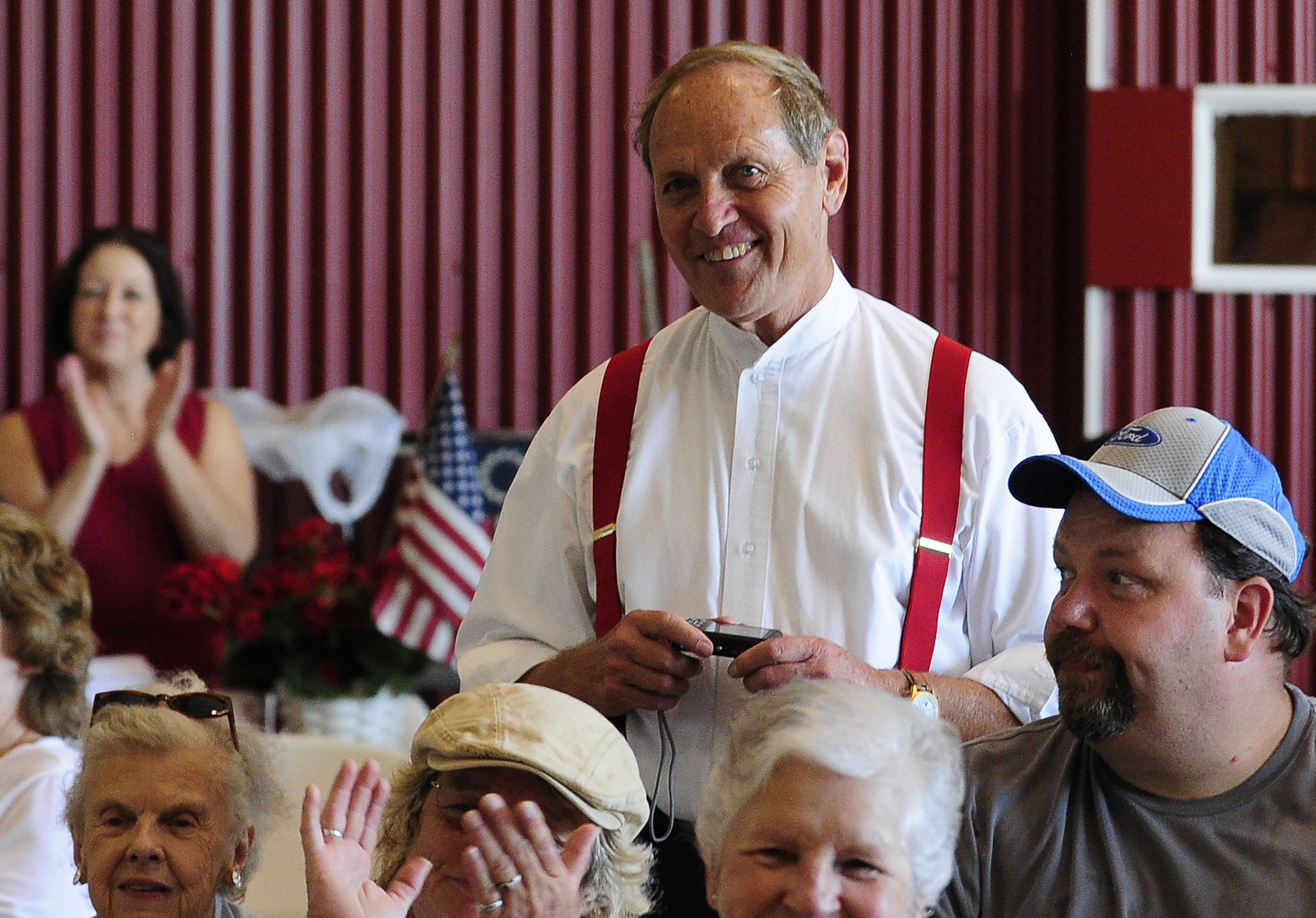 Wearing a Golden Age of aviation period costume, Peach State Aerodrome owner Ron Alexander is recognized at Candler Field Museum during the 2011 Vintage Day celebration in Williamson, Georgia. Alexander and a passenger died in a Jenny vintage airplane crash Nov. 17. Photo by David Tulis.