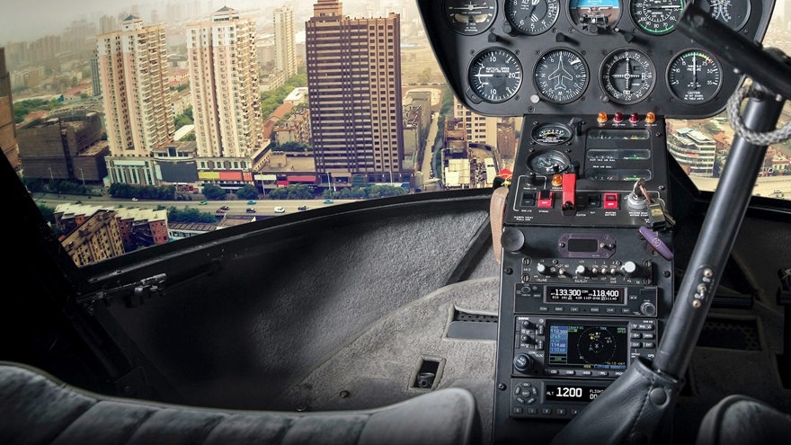 This Robinson R44 boasts a Garmin GTX 345 1090ES transponder, for ADS-B Out and In, below its GNS 430W navigator. Photo courtesy of Garmin International Inc.