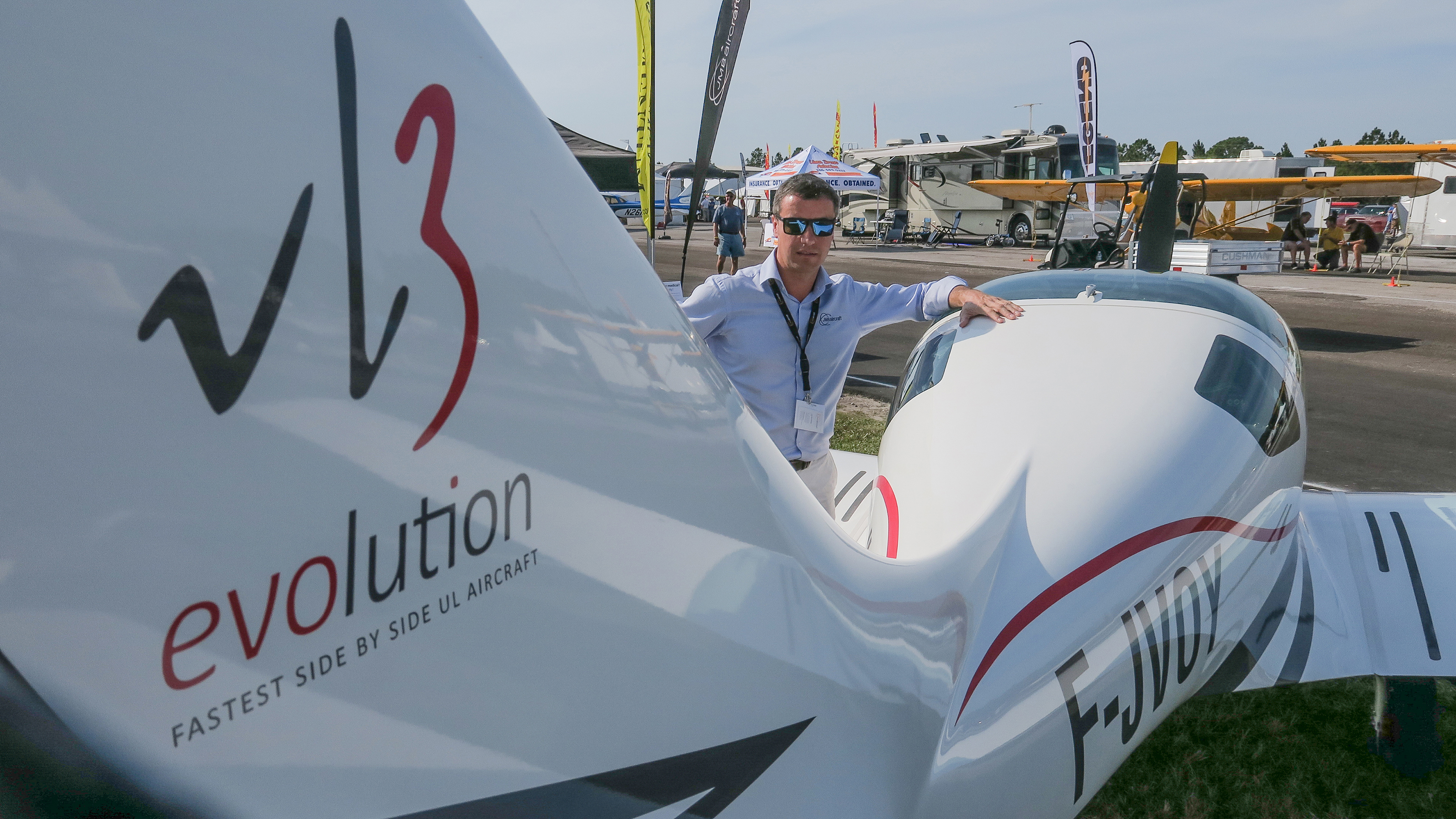 JMB CEO Jean-Maire Guisset alongside the VL3 at the Deland Sport Aviation Showcase. Photo by Alton Marsh.