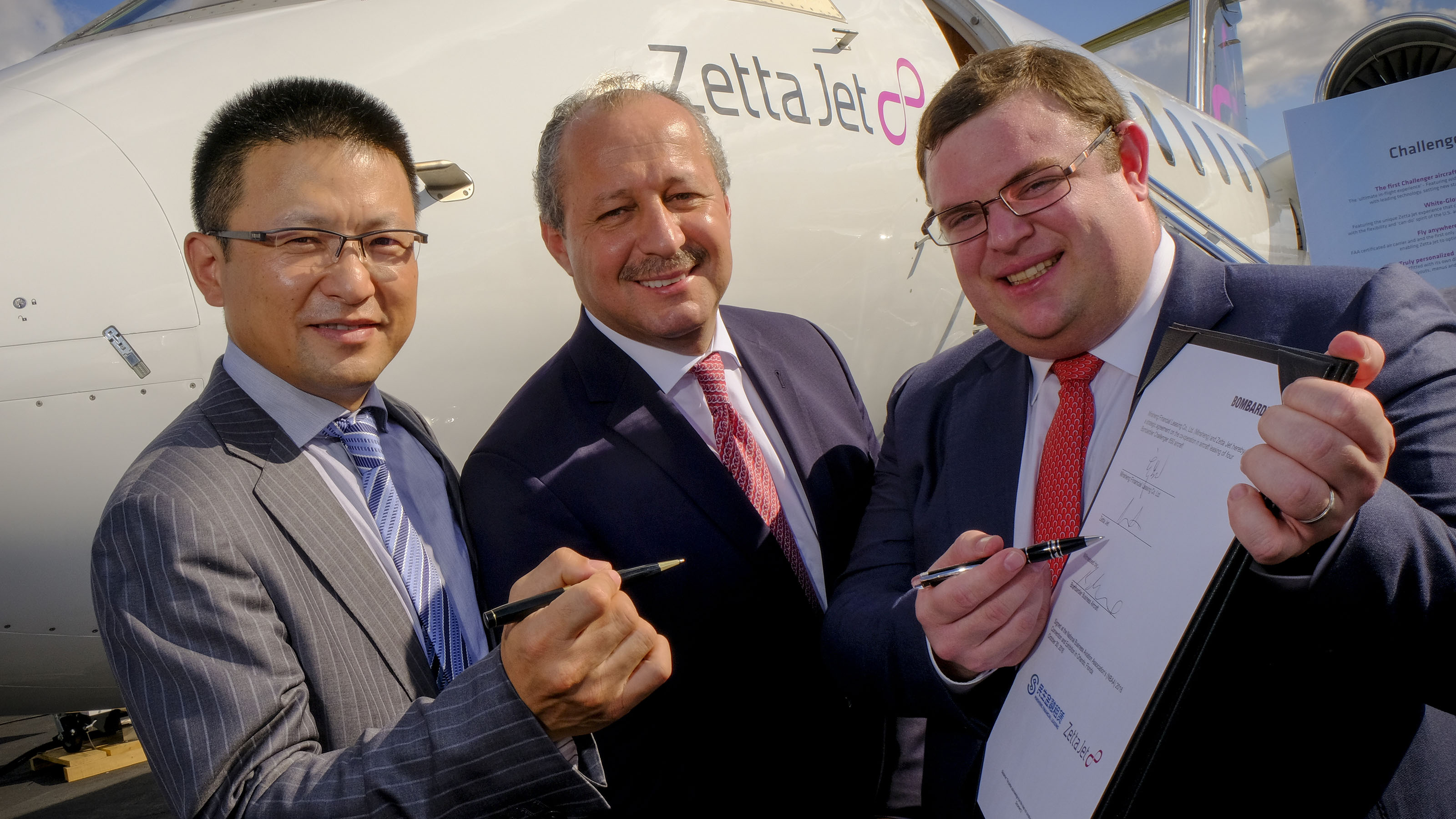 Qiao Kai, Vice President of Minsheng Financial Leasing; Khader Mattar, Vice President of Sales, Middle east, Africa, and China, Bombardier Business Aircraft; Geoffery Cassidy, Managing Director, Zetta Jet. Photo courtesy of Bombardier.