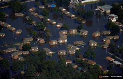 An aerial view shows a neighborhood that was flooded after Hurricane Matthew in Lumberton, North Carolina, October 10, 2016. REUTERS/Chris Keane