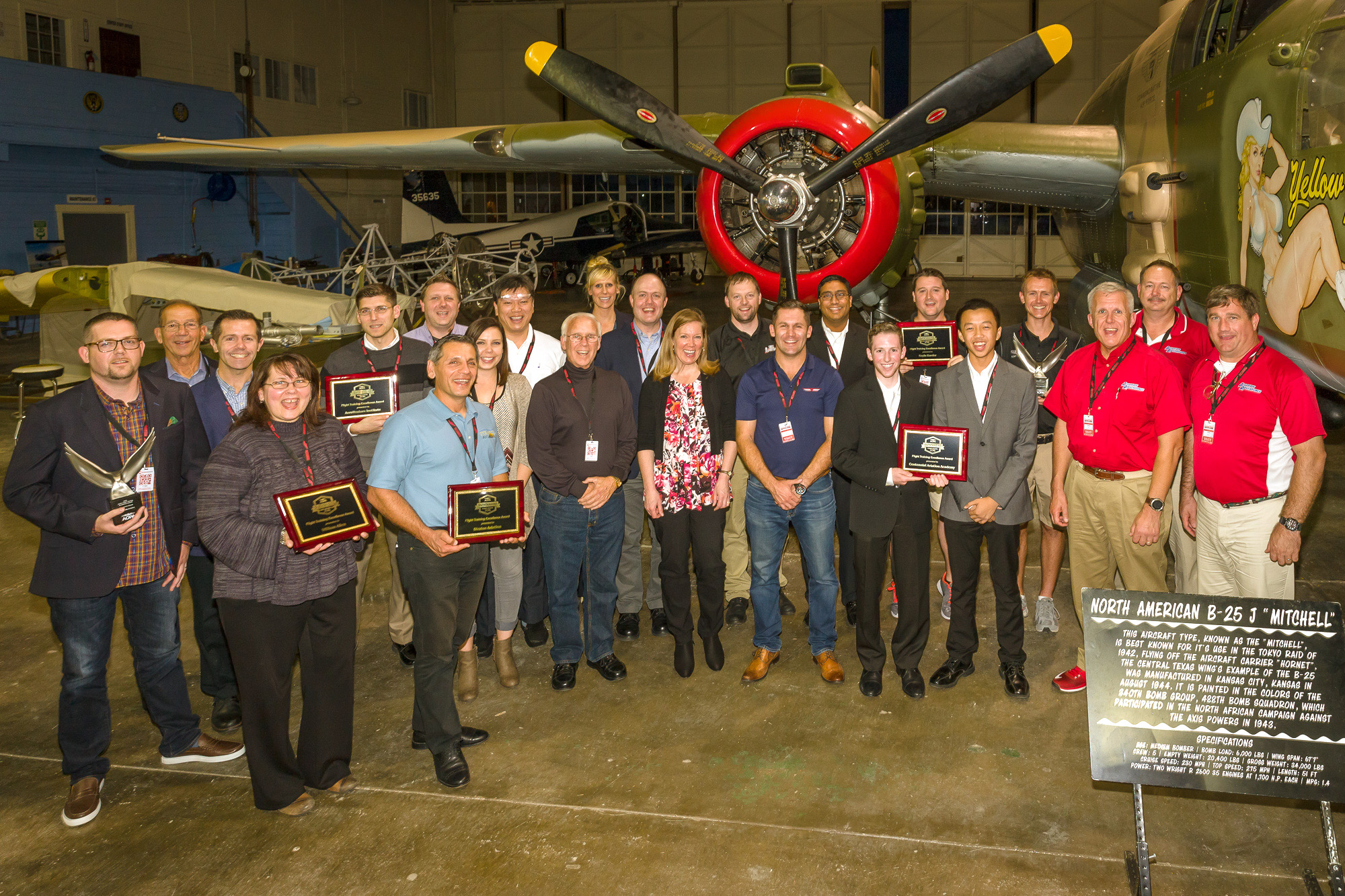 Winners of AOPA's 2016 Flight Training Excellence Awards gather for a group photo during Redbird Flight Simulation's annual Migration conference in San Marcos, Texas, Oct 25. Photo by Michael Hart.