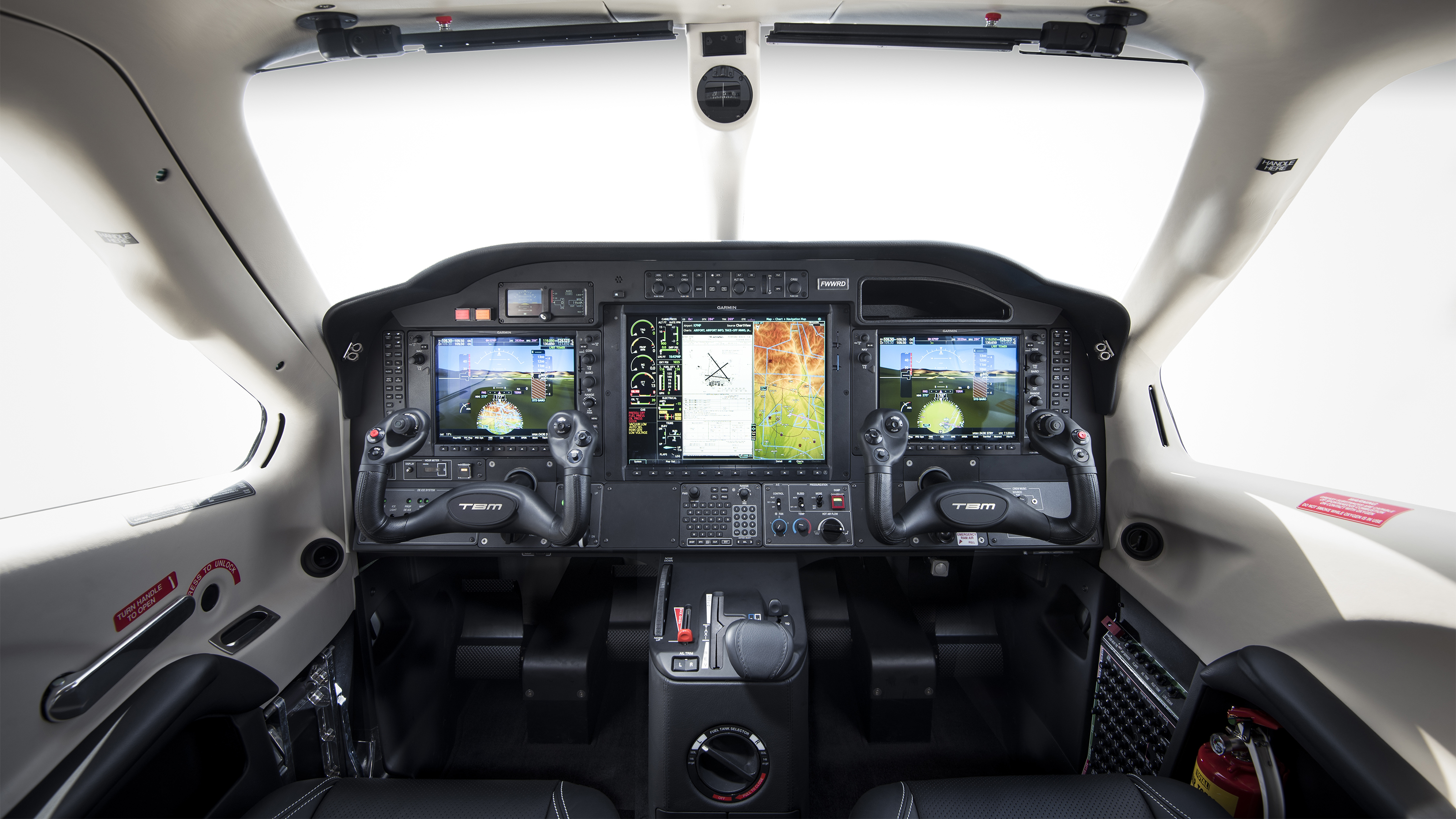 The new TBM 910 features the upgraded Garmin G1000 NXi panel. Image courtesy of Daher.