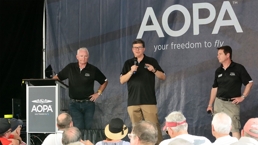 From left, Mark Baker, AOPA presdient; Jonathan Freed, senior vice president of communications; and Tom Haines, senior vice president of media and outreach, discuss high FBO fees during Baker's Pilot Town Hall at Sun 'n Fun 2017. Photo by Mike Collins.