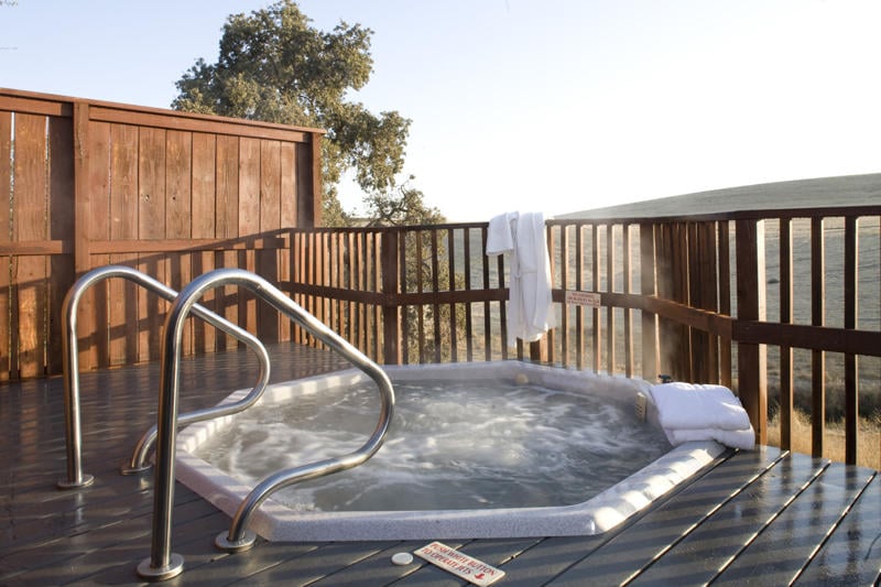 At the River Oaks Hot Springs & Spa, you can soak in mineral water straight from the hot springs as you gaze out at the surrounding hillsides through a pleasant steam-and-wine-induced fog. Indoor tubs, massages, skin treatments, wraps, and other treatments are available. Photo courtesy River Oaks Hot Spring & Spa.