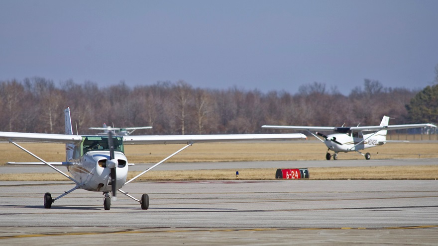Cessna Skyhawks taxi to the Southern Illinois University Carbondale flight line after landing at Southern Illinois Airport in Carbondale/Murphysboro, Illinois. Donations from alumni are helping to equip the university's fleet with ADS-B equipment in advance of the FAA mandate. Photo courtesy of Southern Illinois University.