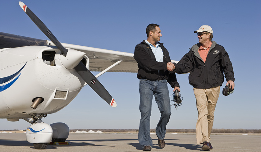 One way contemporary pilots can pay homage to the Wright Brother’s first flight is to provide a first flight to someone they know. Photo by Mike Fizer.