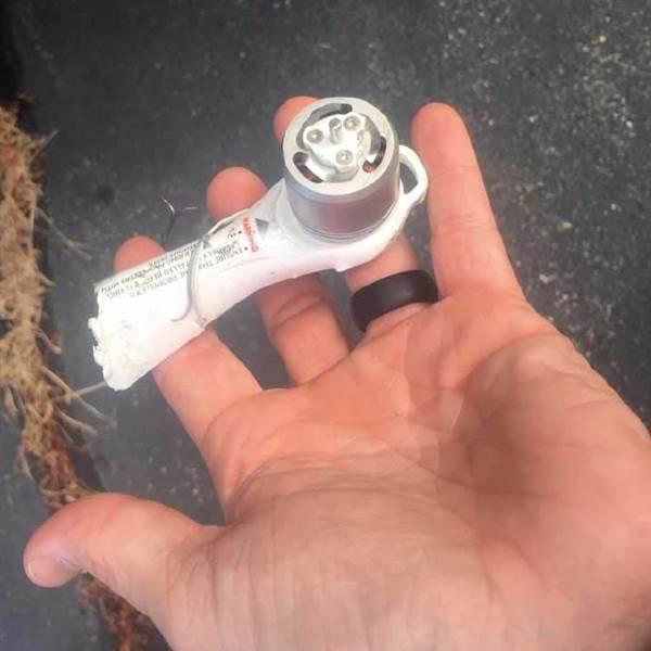 This motor arm from a DJI Phantom 4 quadcopter was recovered from inside the UH-60M Black Hawk helicopter that it collided with, and proved the key piece of evidence that led the NTSB to the drone pilot. NTSB photo. 