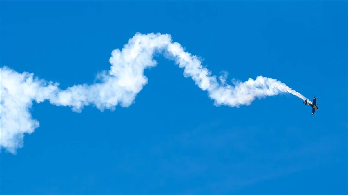 University of North Dakota aerobatic team coach Mike Lents performs an aerobatic routine in an Extra 300. Photo courtesy of Mike Lents, University of North Dakota.