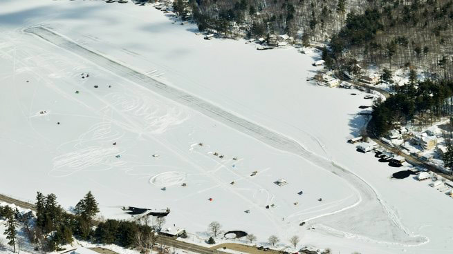 The Alton Bay Ice Airport looks different than it appears in this image from a few years ago; volunteers have expanded the aircraft parking area—and now plow a parallel taxiway. Photo by Mike Collins.