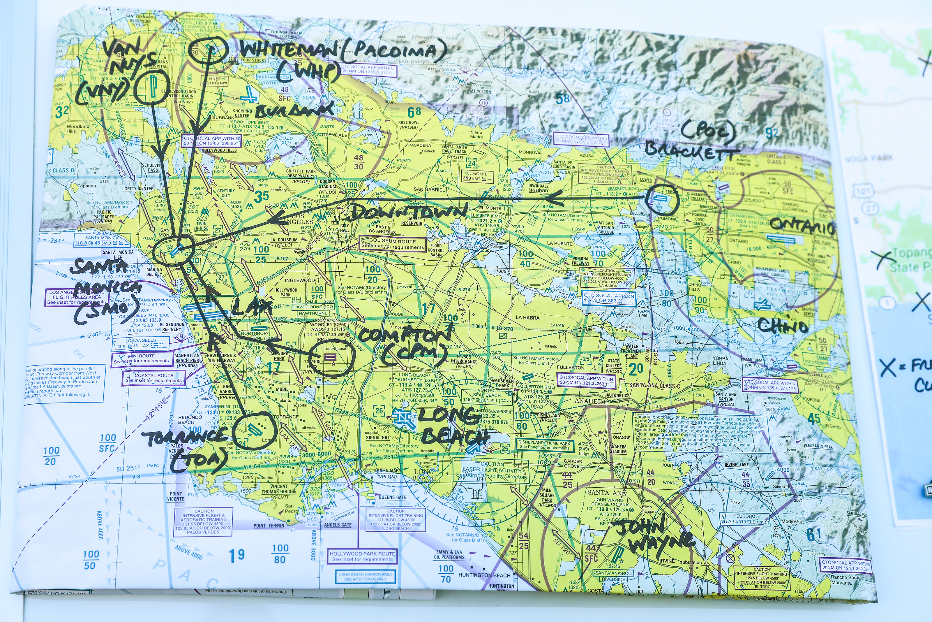 The Disaster Airlift Response Team maps out its strategy for providing air transportation in the event of a natural disaster that takes out the Los Angeles regional freeway system. Photo by Roxanne Schorbach at Schorbach.com.