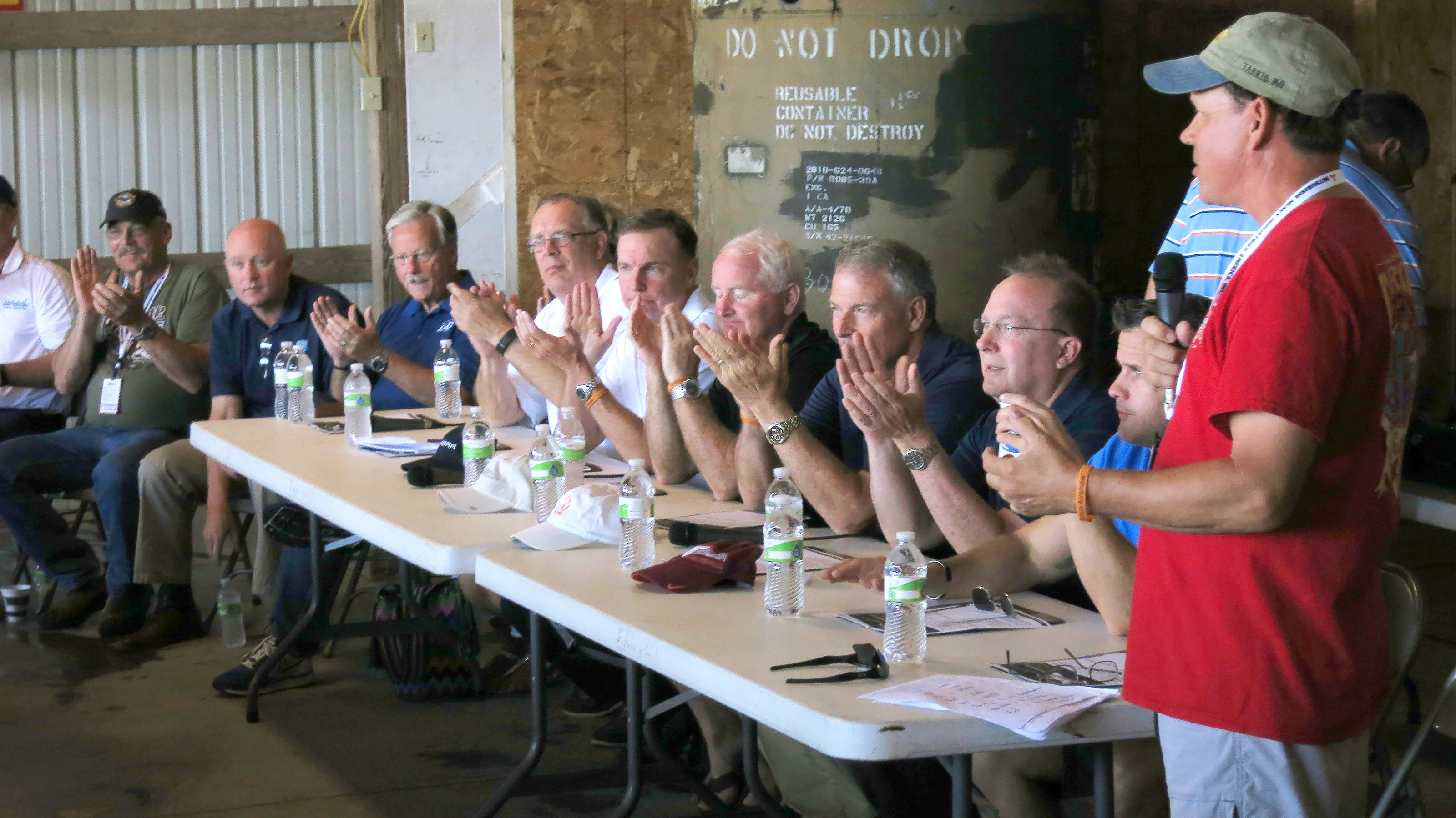 Rep. Sam Graves (right) speaks at the pilot town hall during the Wingnuts Flying Circus in Tarkio, Missouri.