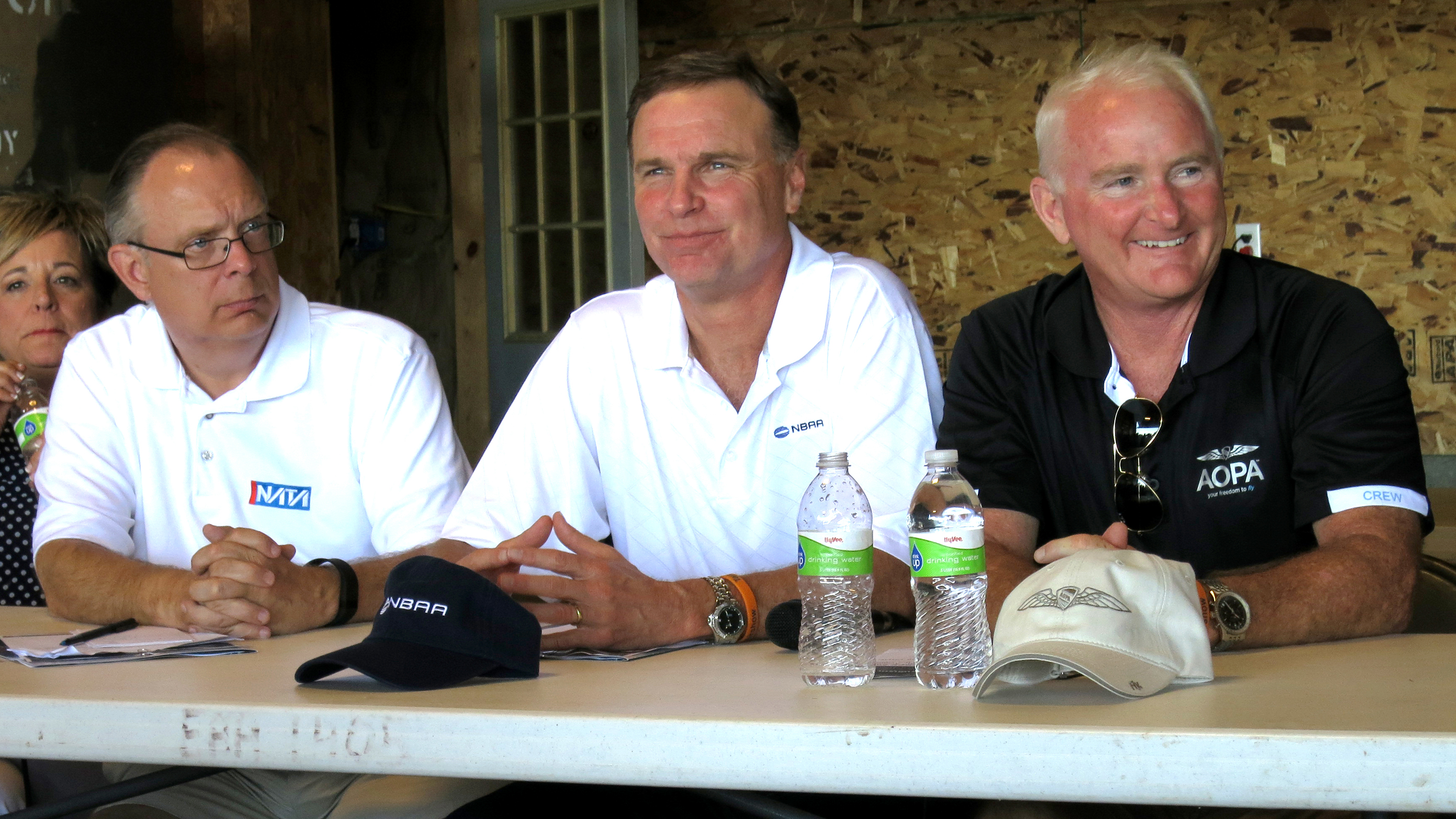 From left, NATA Executive Vice President of Government and External Affairs Bill Deere, NBAA President Ed Bolen, and AOPA President Mark Baker participate in the Wingnuts Flying Circus in Tarkio, Missouri.