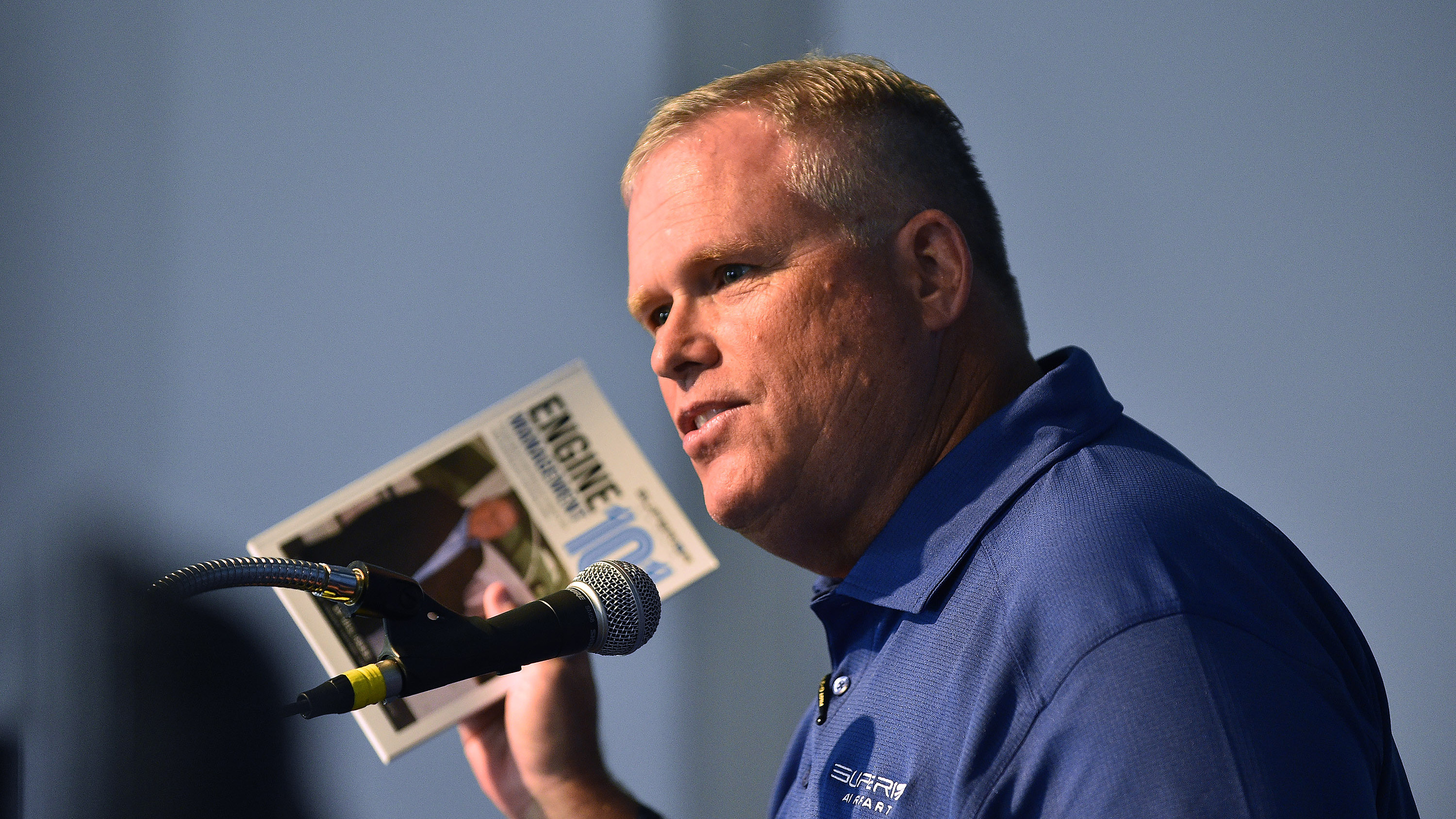 Bill Ross, the vice president of product support for Superior Air Parts, describes some of the engine operating tips in his book, "Engine Management 101," made available during EAA AirVenture  in Oshkosh, Wisconsin, July 24. Photo by David Tulis.