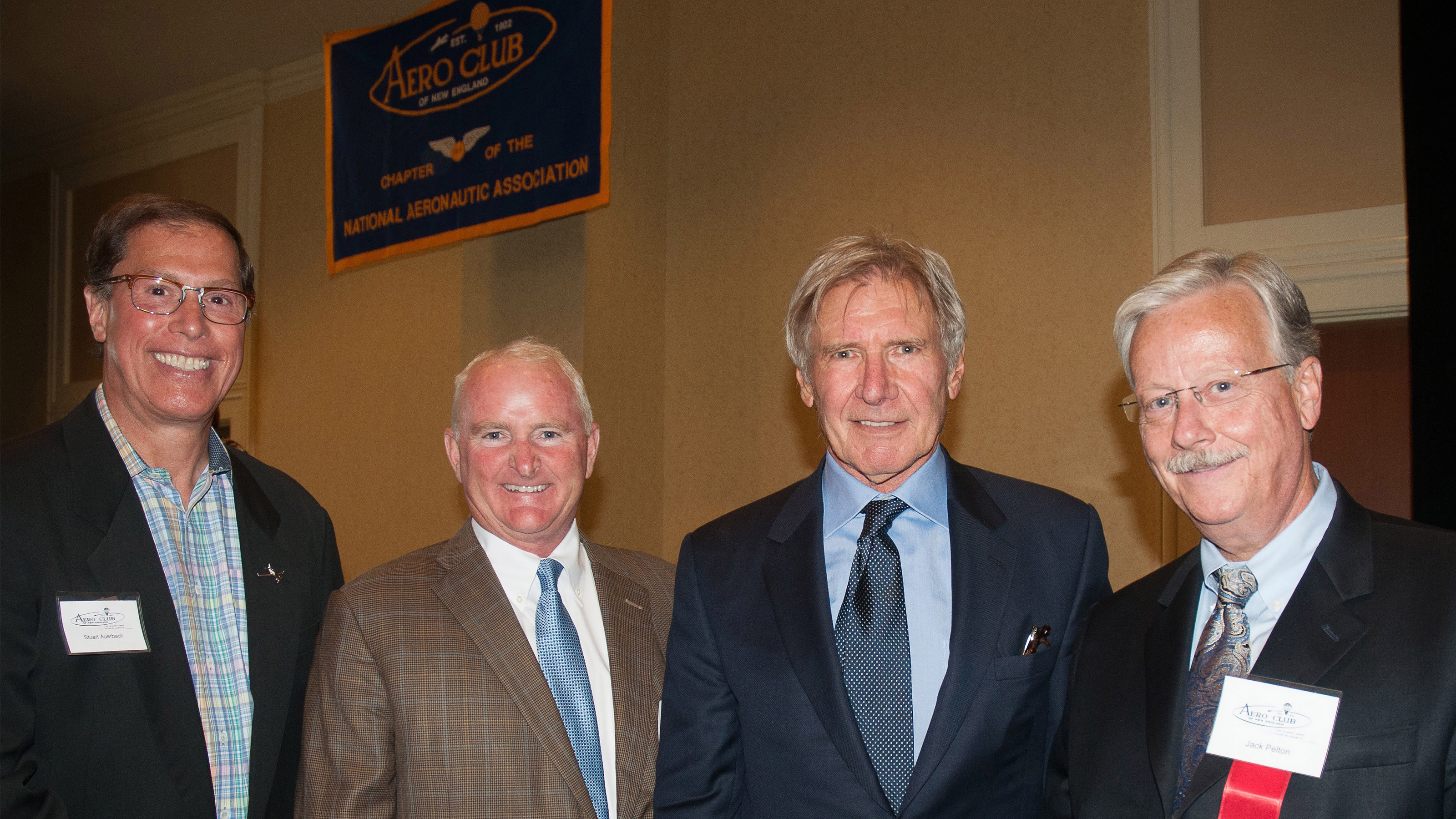 Stuart Auerback, Mark Baker, Harrison Ford and Jack Pelton attend the Aero Club of New England Cabot Award ceremony. Photo courtesy of Gary P. Kearney.