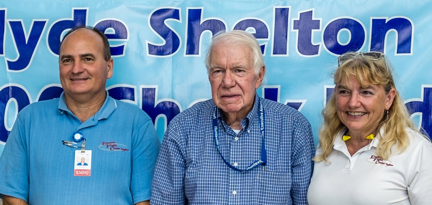 Clyde Shelton with Executive Flight Center owners Ray and Donna Meyer. Photo courtesy of Marty Sellers/sellersphoto.com.