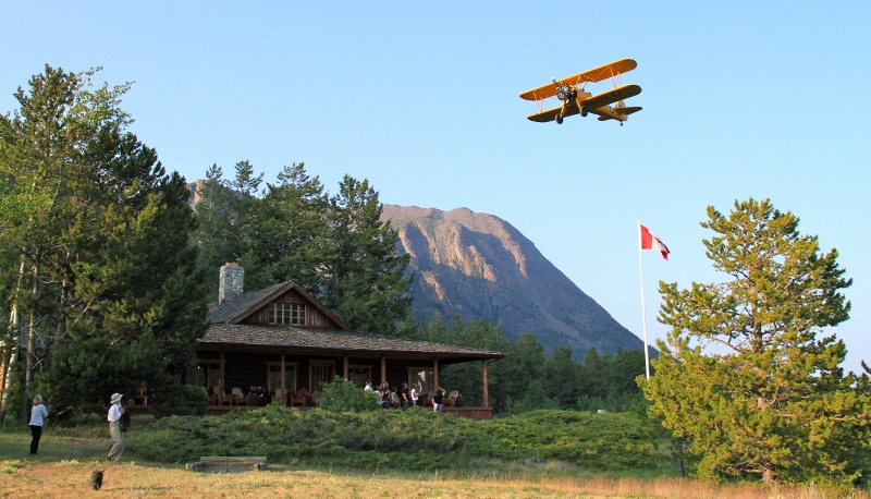 A Stearman on short final to the private turf runway at Tsuniah Lake Lodge, British Columbia's premier fly-in resort lodge. Photo courtesy Eric Brebner.