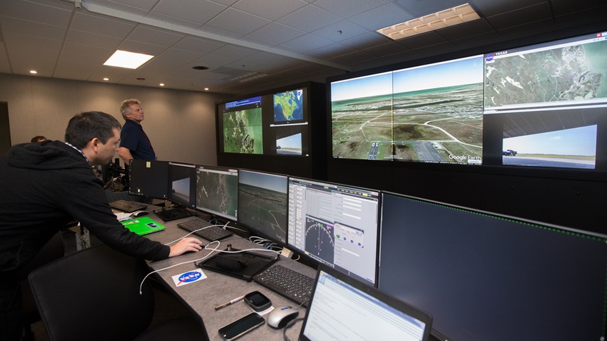 A laborartory at the NASA Ames Research Center has been set up as an unmanned aircraft traffic control test center where researchers coordinate and monitor fights at test centers around the country. Jim Moore photo.