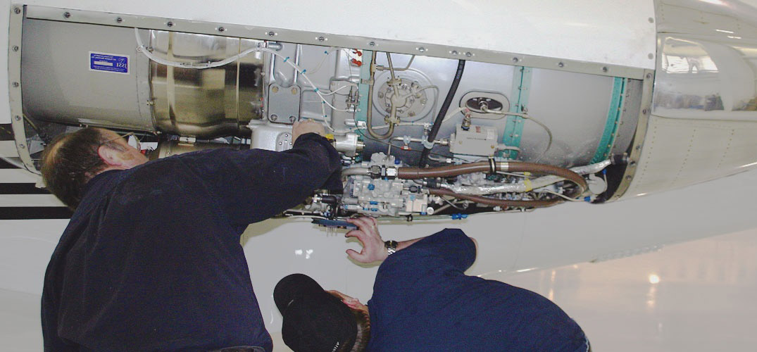 Texas State Technical College A&P mechanics work on a jet engine. Photo courtesy of Texas State Technical College.