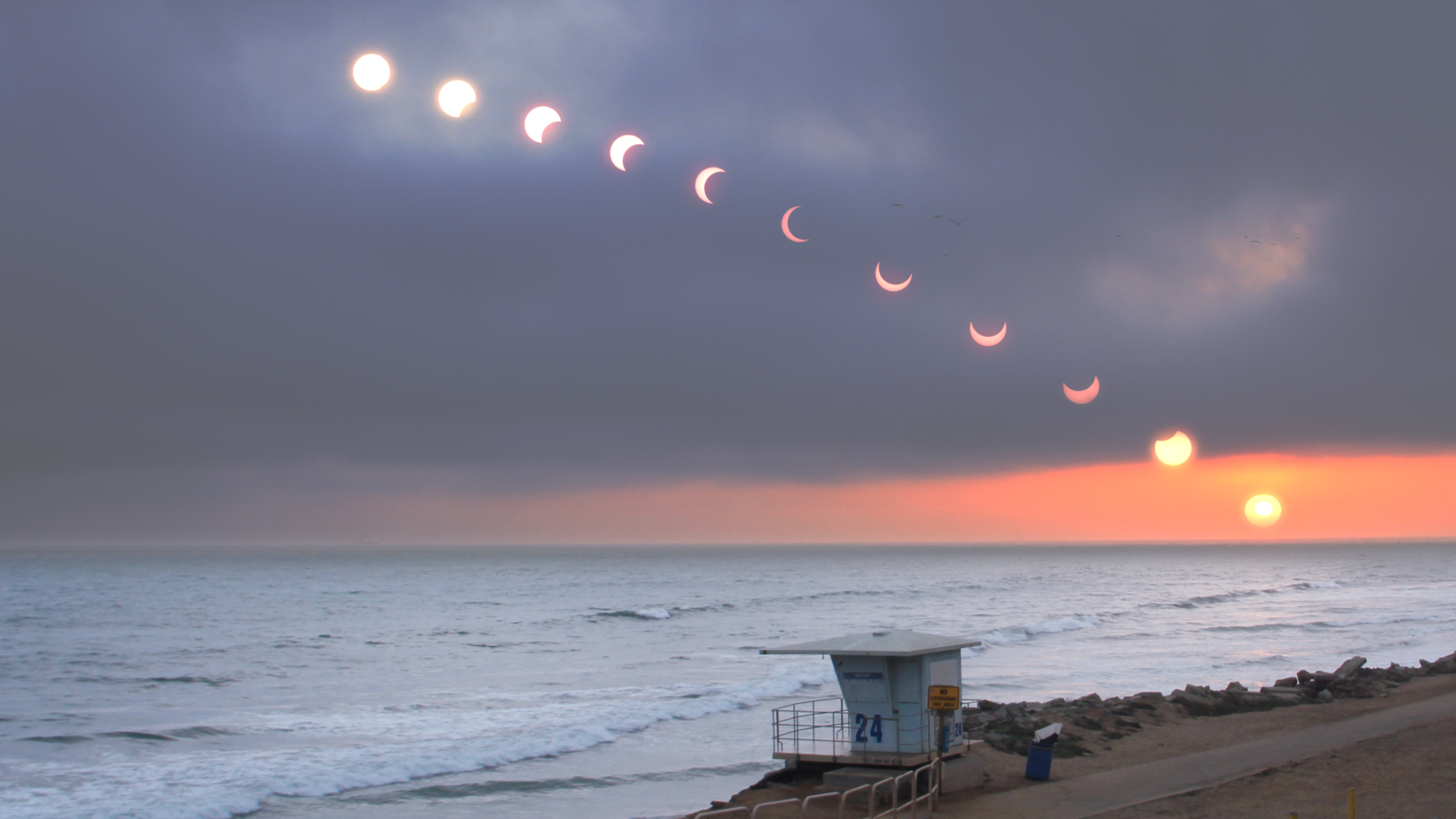 On May 20, 2012 the moon passed between the Sun and Earth. The partial eclipse was seen and time-lapse photographed near Huntington Beach, California. Photo by Jimnista via Flickr.