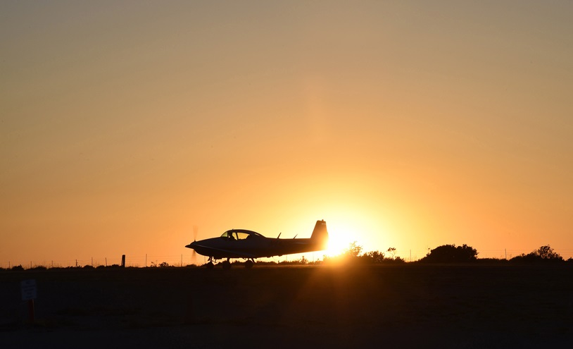 Pat Mullen taxies his 1948 Navion past the setting sun at Catalina Island's Airport in the Sky during an inaugural fly-out hosted by the Cessna Pilots Society following the AOPA Fly-In at Camarillo, California, April 29. Photo by David Tulis.